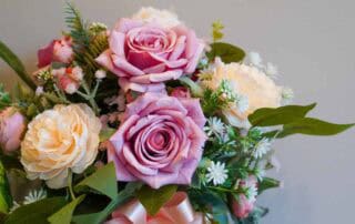 front view pinks and yellow rose flowers and green leaf on white background, nature, template, decor, copy space